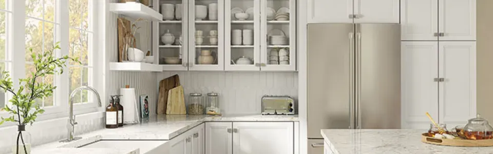 photo of clean, white-colored cabinets and an otherwise imaculately clean kitchen